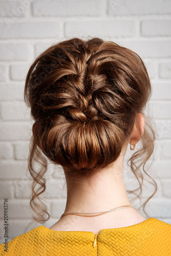 Hairstyle High Bun On The Head Of The Brunette Rear View Women S