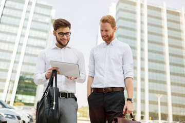 Wall Mural - Business people talking outdoors