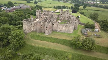 Wall Mural - Aerial drone view of the ruins of a medieval castle (Raglan Castle, Wales)