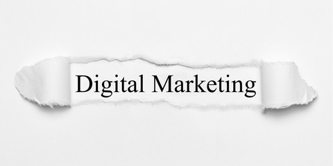 Digital Marketing on white torn paper