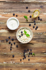 Canvas Print - Cottage cheese with blueberries and sour cream