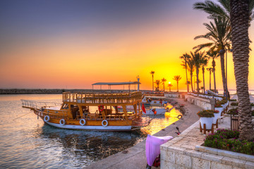 Wall Mural - The harbour with boats in Side at sunset, Turkey