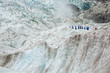 © Michael Evans - Walking through the ice at Franz Josef glacier, South Island New Zealand, with unidentified hikers