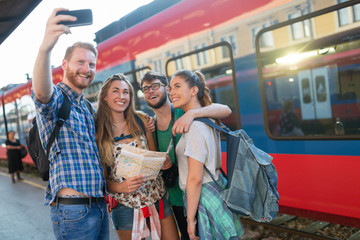 Wall Mural - Young group of travelling tourists