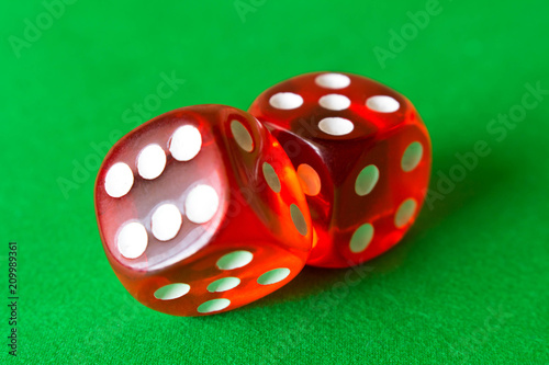 Dice on a green background . Game concept. Games of chance Poster
