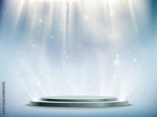 Fotografía Background of round podium illuminated by searchlights.
