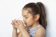 © kaganskaya115 - Cute little girl holding glass of water. and Child drinking water.