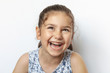 © kaganskaya115 - Portrait of a happy laughing child girl. Smiling child. Expressive facial expressions.