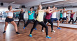 © JackF - Dancers learning  zumba elements in gymnastics class