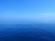Blue ocean meets blue sky in an endless horizon