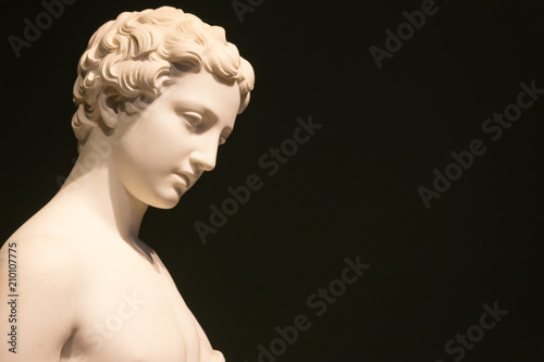 Marble Statue Of A Woman With Short Hair With Bare Shoulders With