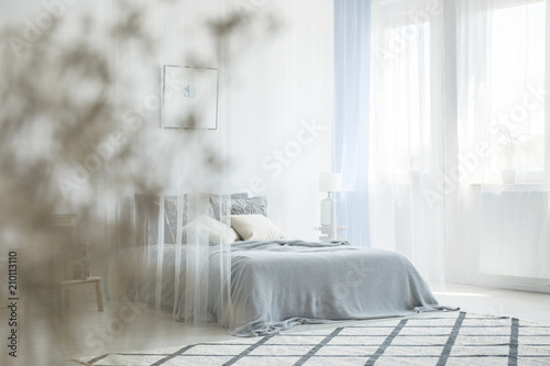 Cuadros en Lienzo White bedroom interior with carpet, window with drapes and king-size bed with ca