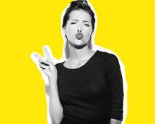 Cheerful Smiling Fashion Girl Going Crazy In Casual Black Clothes With Red Lips On White Background Making A Duck Face And Showing Peace Sign