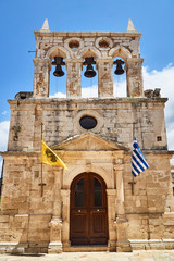 Poster - Facade and belfry of the historic church on the island of Crete.