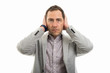 © Catalin Pop - Portrait of business man covering ears gesture