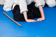 © Lidia_Lo - Aikido makes a slope, next to the tatami lies bo for training