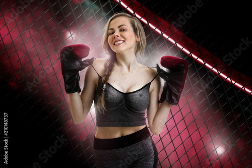 Cuadros en Lienzo Cheerful young girl mma fighter smiles