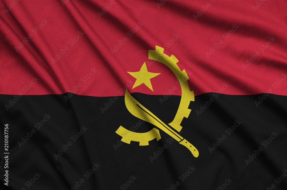 Obraz na płótnie Angola flag  is depicted on a sports cloth fabric with many folds. Sport team banner w salonie