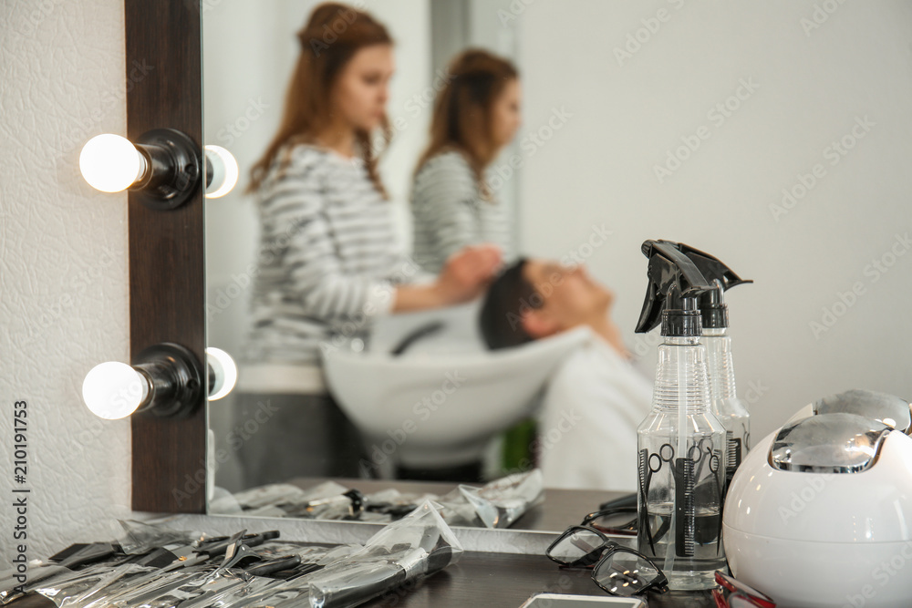 Hairdresser's tools on table in salon