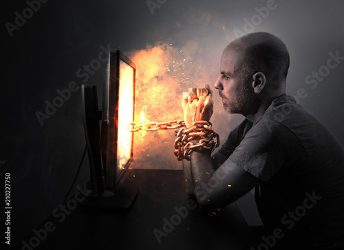 Chained to flaming computer