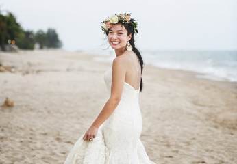 Wall Mural - Beautiful bride by the sea