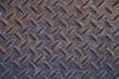 © claire - Rusty grungy Industrial Checker Plate Background Texture with Rusty Worn Embossed Raised Diamond Pattern Wallpaper