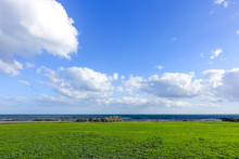 Green Grass By Seaside Against Blue Sky. Williamstown, VIC Australia.