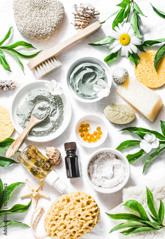 Flat lay beauty skin care ingredients, accessories. Natural beauty products on a light background, top view - obrazy, fototapety, plakaty 