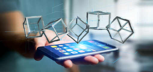 Poster - Man holding a 3d rendering blockchain cube isolated on a background