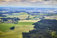 Aerial View Of South Bohemian Landscape With Fields, Forests And Dramatic Sky In Czech Republic.