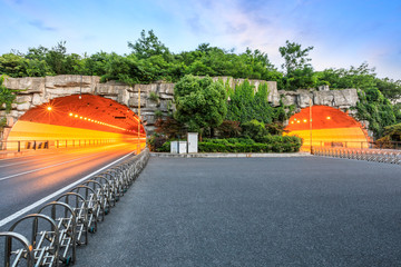 highway road tunnel at dusk,traffic concept