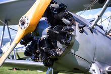 Vintage Aircraft With Radial Engine And Wooden Propeller, Close Up Of Nose Section