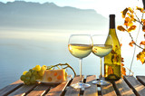 Fototapeta Most - Wine against vineyards in Lavaux, Switzerland