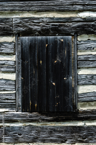 Fotografía Close-up of a boarded up log cabin window
