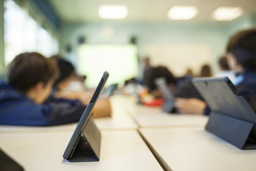 children study in class with their tablet