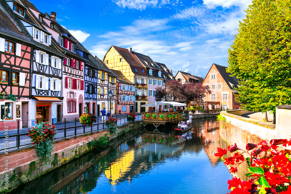 Most beautiful traditional villages of France - Colmar in Alsace with traditional colorful houses - obrazy, fototapety, plakaty 