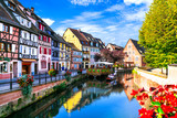 Fototapeta Fototapety z mostem - Most beautiful traditional villages of France - Colmar in Alsace with traditional colorful houses