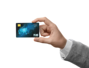 Wall Mural - Young man holding credit card on white background