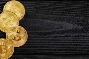 Wall Mural - Gold Bitcoin money on wooden table. Electronic crypto currency