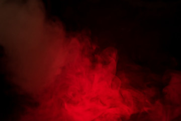 red smoke on a black background