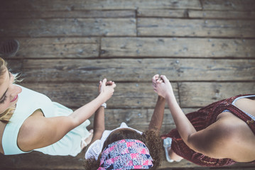 Sticker - happy gay couple spending time together with their adopted daughter