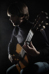 Acoustic guitar player. Classical guitarist