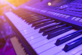 Piano keyboard instrument closeup. Home synthesizer