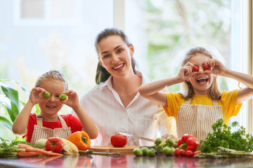 Wall Mural - Happy family in the kitchen.