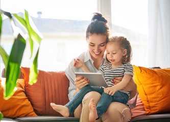 mom and child with tablet