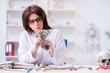 © Elnur - Doctor working in the lab on skeleton