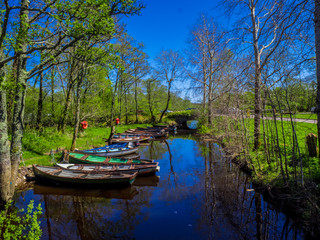 Small boats lying in a creek of Killarney National Park in Ireland