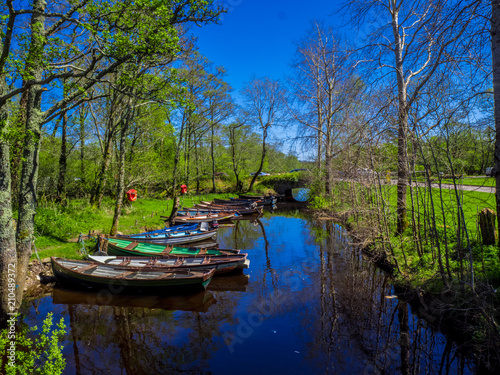 Small Boats Lying In A Creek Of Killarney National Park In Ireland