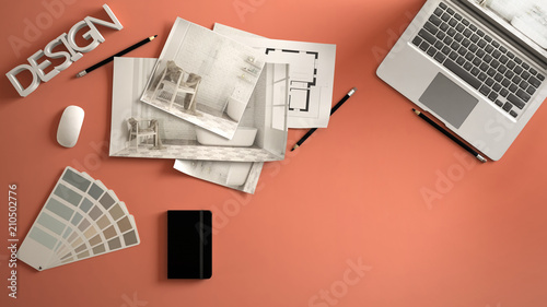 architect designer concept red work desk with computer paper draft