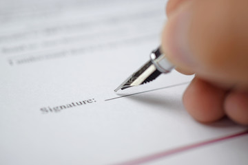 Poster - Signing a form